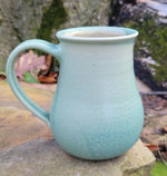 Load image into Gallery viewer, Coffee Mug in Light Turquoise Chevron Pattern
