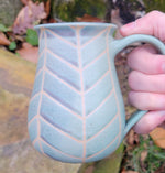 Load image into Gallery viewer, Coffee Mug in Light Turquoise Amethyst Chevron Pattern
