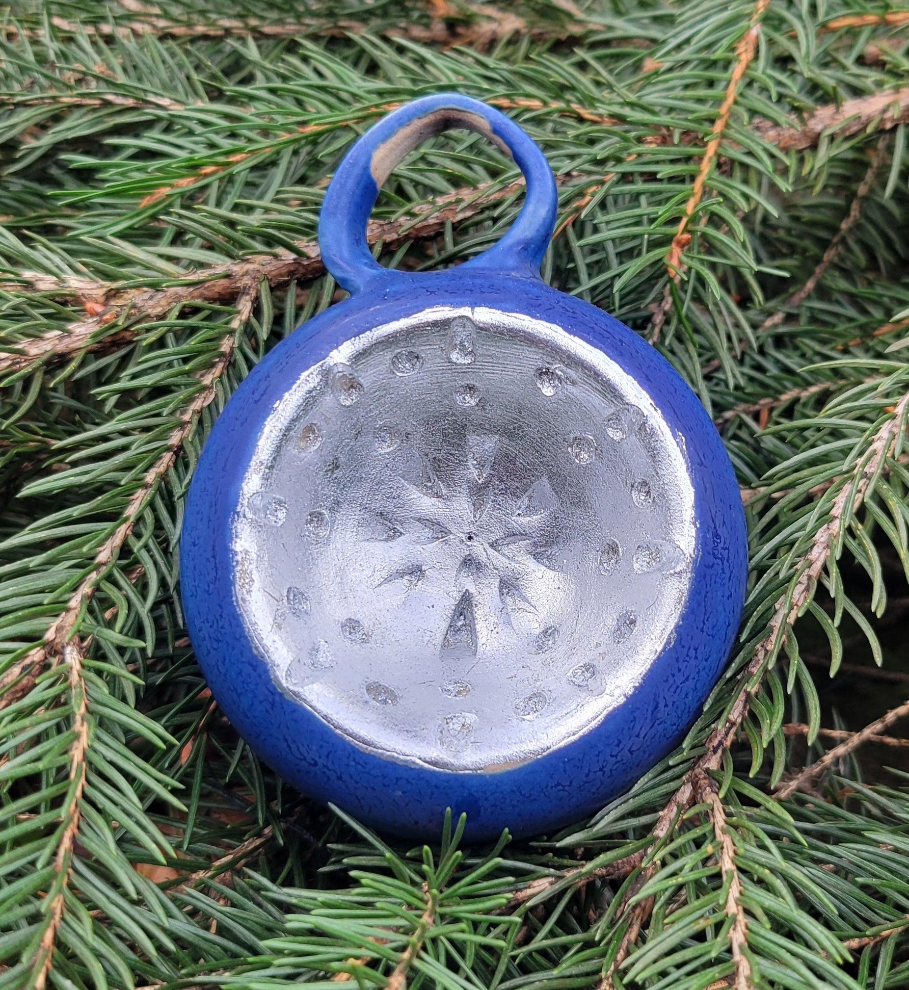 Ornament in Lapis with Silver Leaf