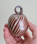 Load image into Gallery viewer, Ornament in Rust Red Linear Pattern
